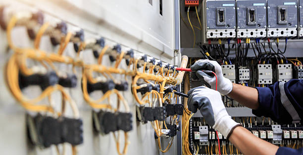 Professional Electrician technician working in Parkville, MD